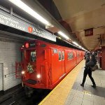 The holiday train arrives into 96th St Station heading to Chambers St